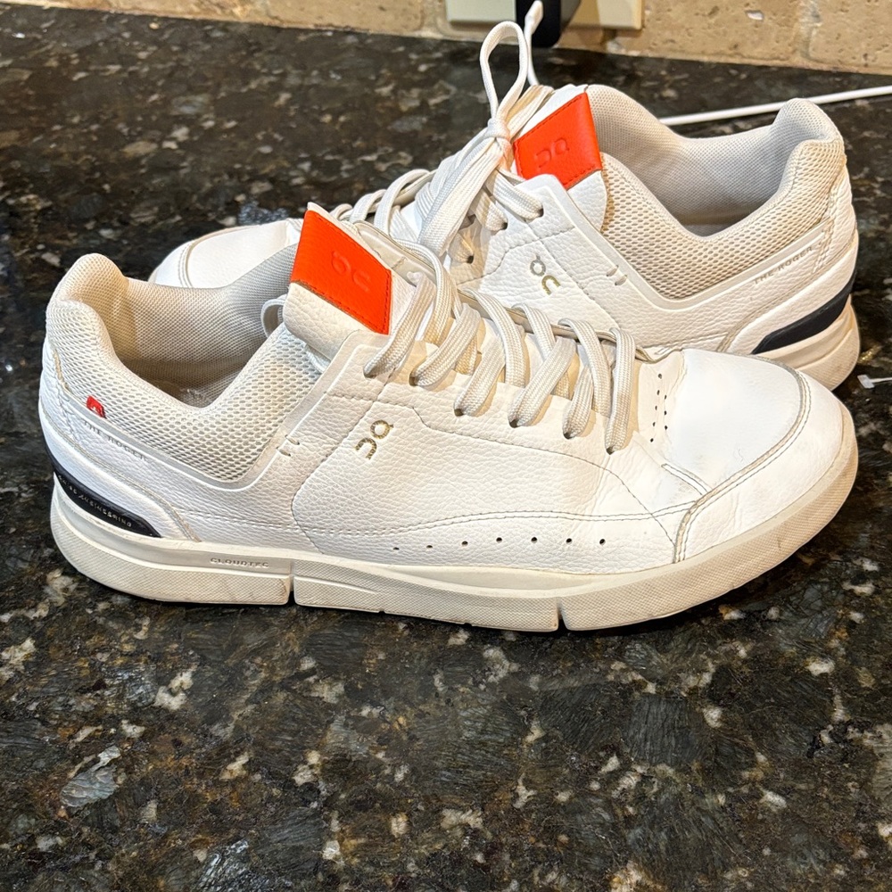 On Running Women's White Sneakers with Orange Tongue Accents